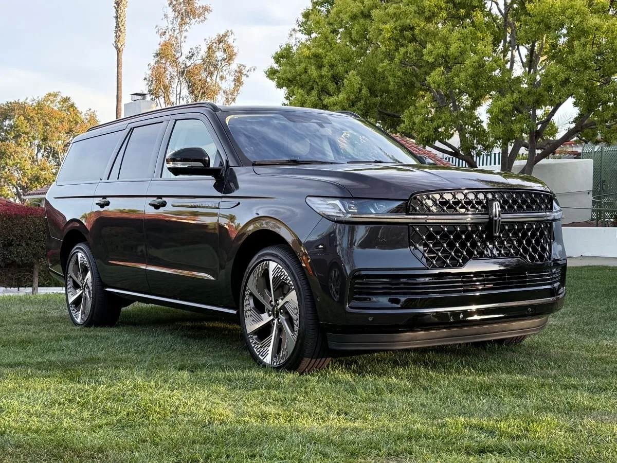 First Class SUV: black Lincoln Navigator