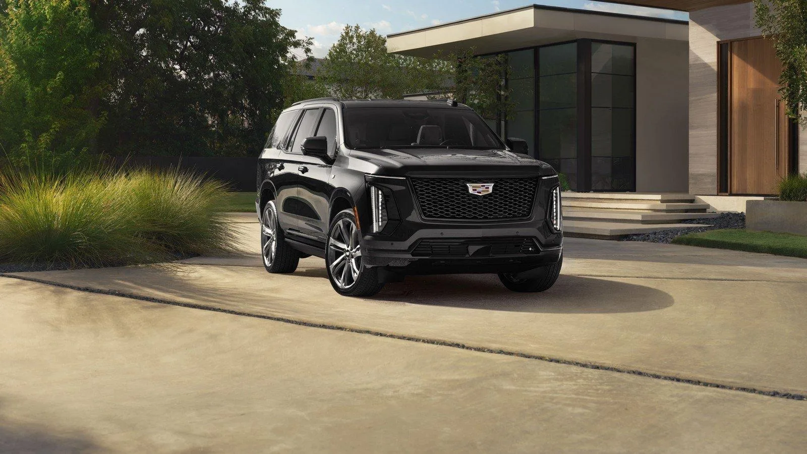 First Class SUV: black Cadillac Escalade
